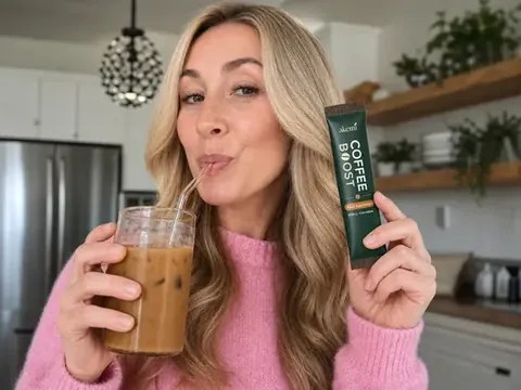 Amy B. with Coffee Boost sachet and iced coffee
